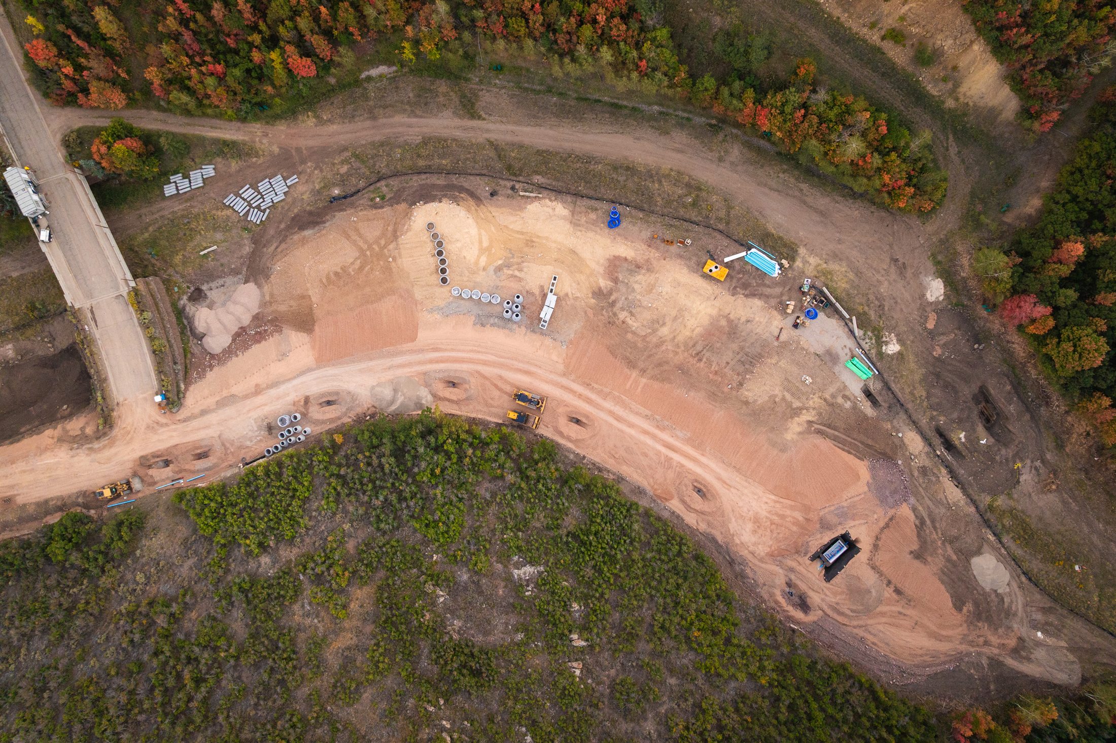 Overhead drone view of grading and utility work